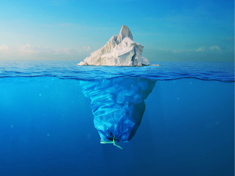 A picture of an iceberg with the bottom submerged.