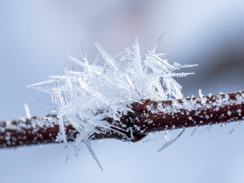 Icicle close up on a copper pipe