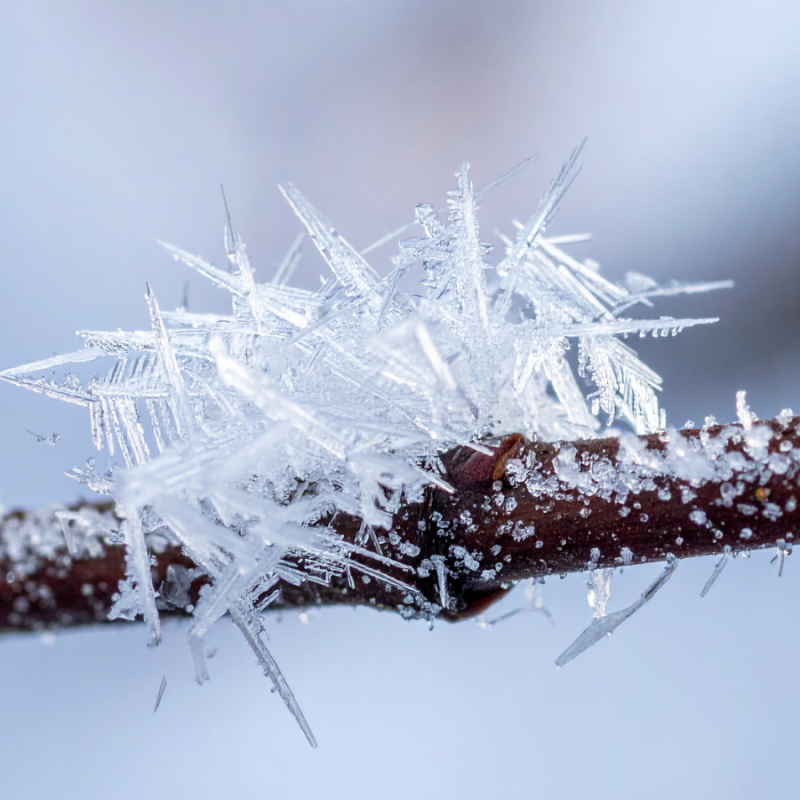 Icicle close up on a copper pipe