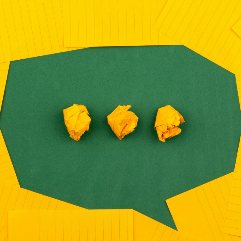 A green speech bubble with dots symbolising self talk